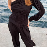 Black Knit 2-Piece Set With An Asymmetrical One-Sleeve Blouse And Palazzo Pants