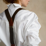 Back detail of a model wearing a modern relaxed-fit office shirt with refined shoulder construction