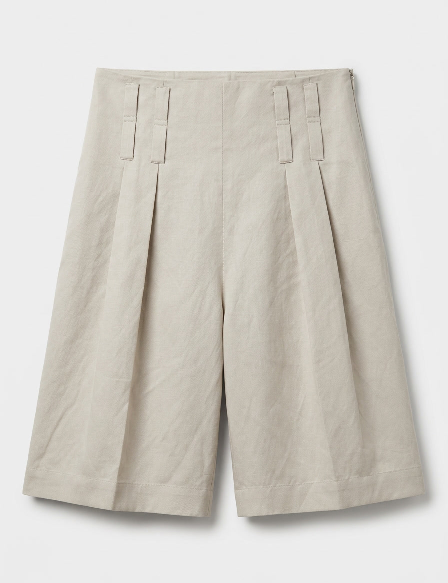 Front product view of sand linen Bermuda shorts with front pleats, wide legs and double belt loops.