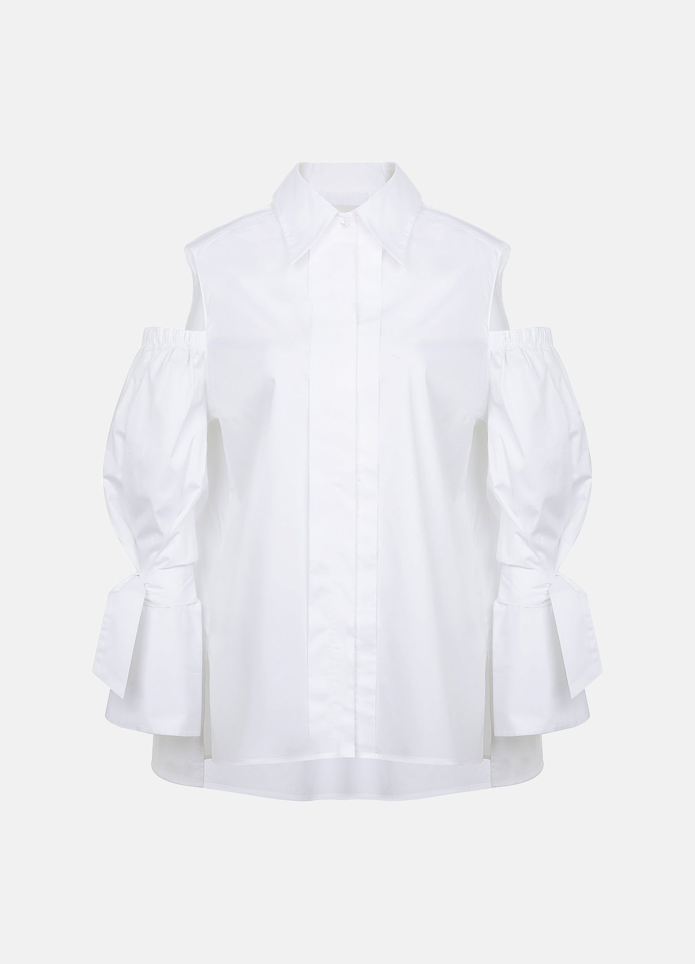 White cotton gabardine shirt with cold-shoulder design, puff sleeves and elongated relaxed fit, front product view